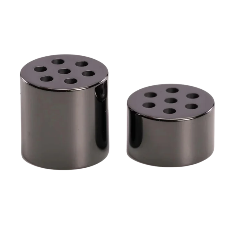 Two DaVinci zirconia spacers in gunmetal, showing perforated top surface, front on angle view