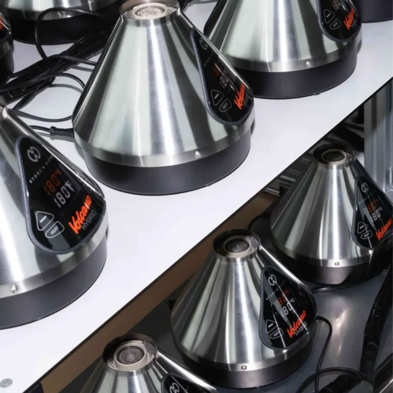 Multiple Storz & Bickel Volcano Hybrid vaporisers on shelves showing digital temperature displays