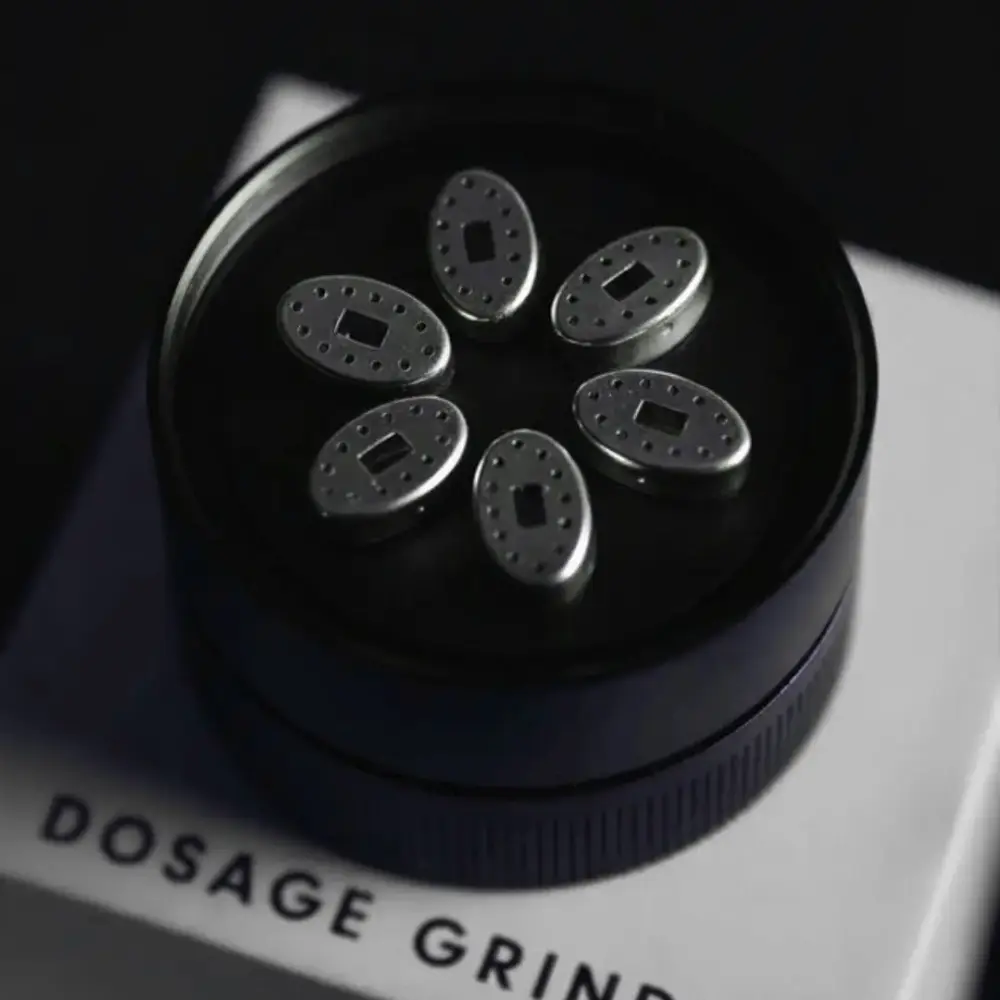 DaVinci Dosage Grinder on branded packaging box